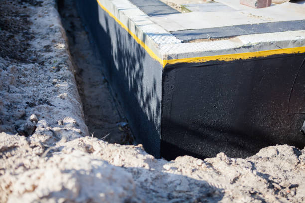 Professional Emergency Waterproofing technician working in Hymera, IN
